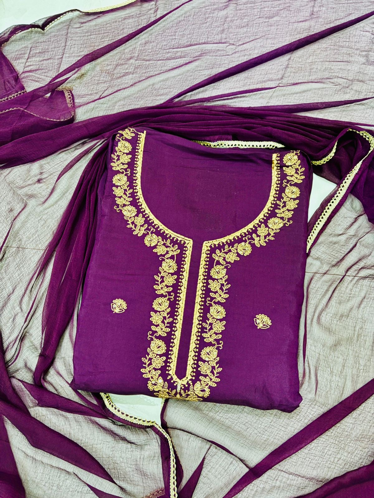 Deep magenta colour suit