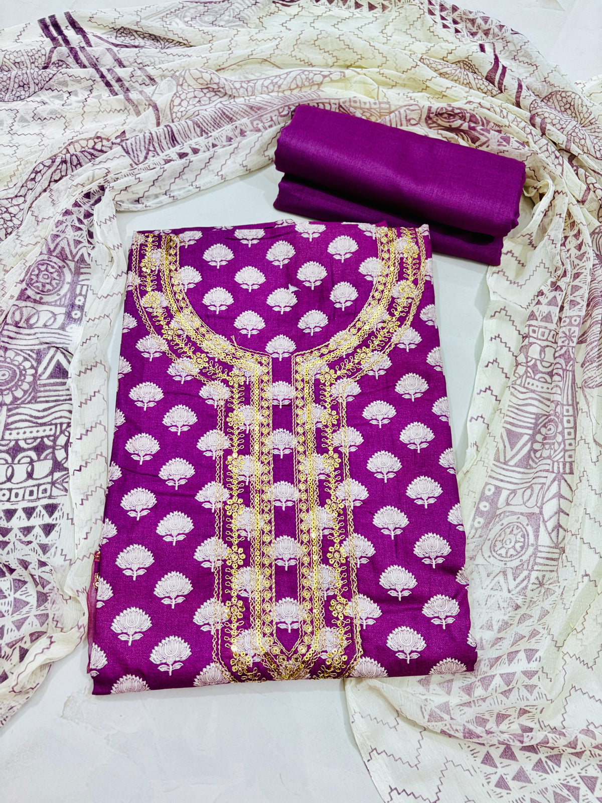 Rayon suit with golden embroidery